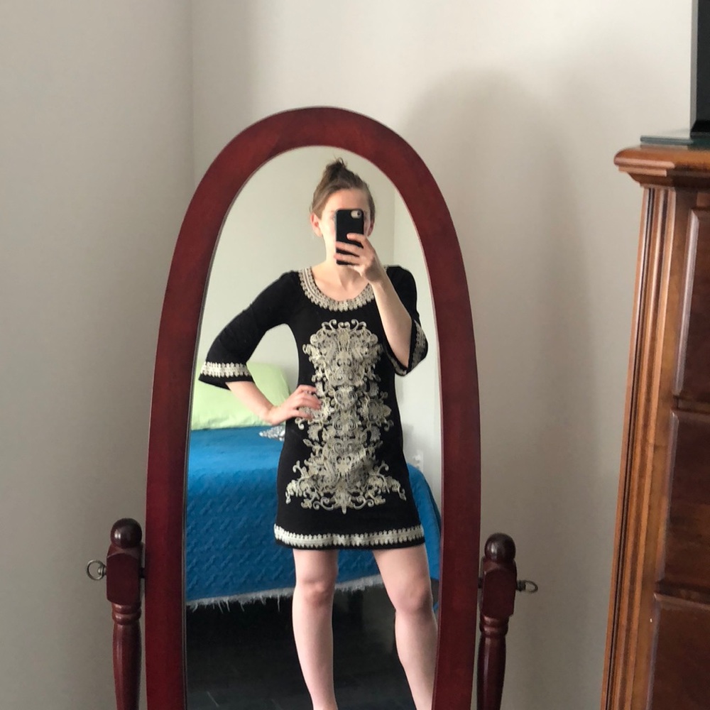 Black embroidered dress with bell sleeves